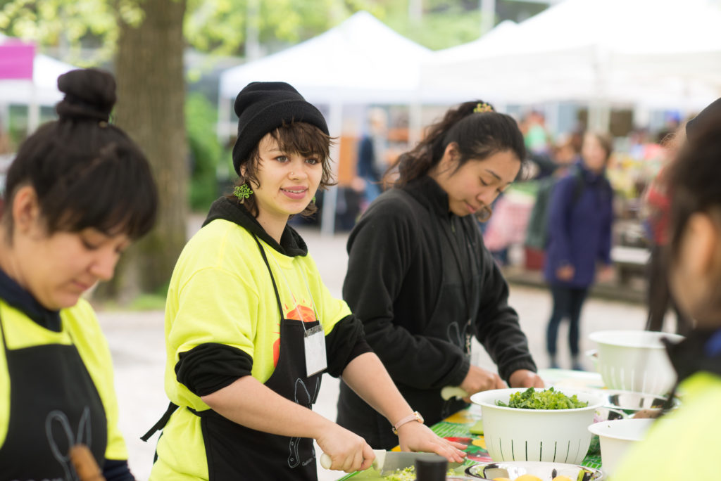 photo of two people preparing food